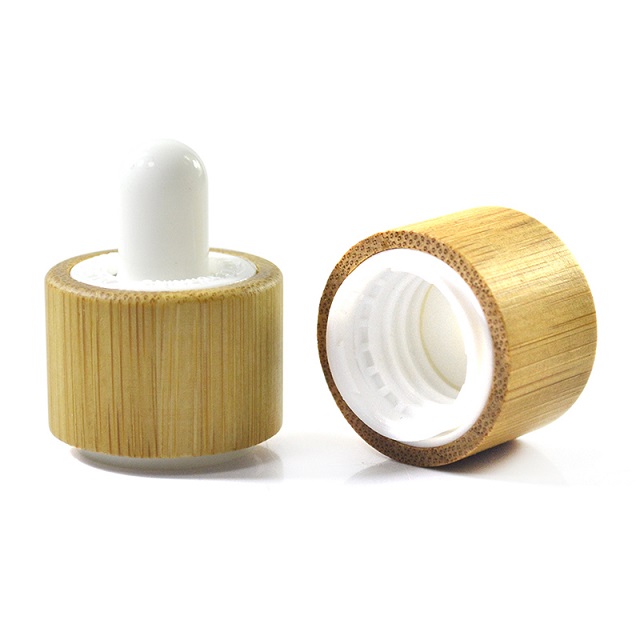 Glass dropper bottle with bamboo lid Стеклянный флакон-капельница с бамбуковой крышкой.
