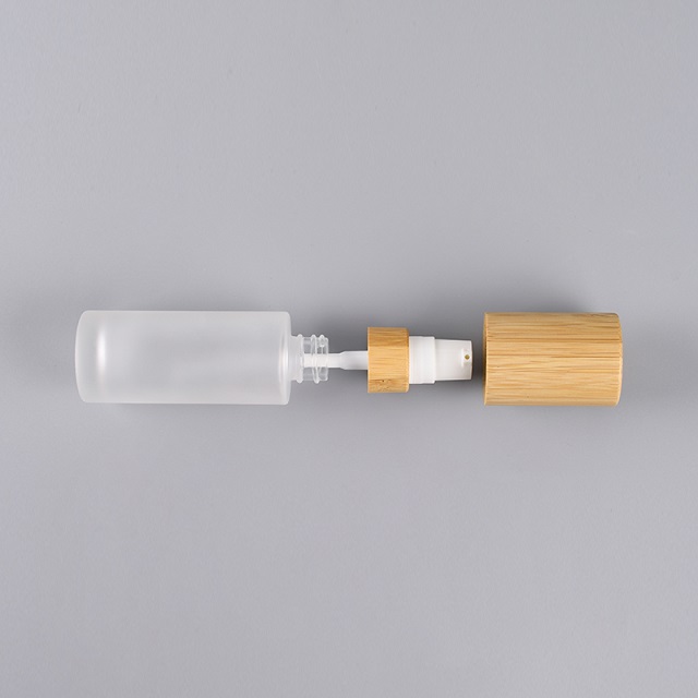 Роскошный 30 мл 50 мл 100 мл Пустой крем-лосьон для ухода за кожей Стеклянный спрей Круглый матовый прозрачный косметический флакон Упаковка с бамбуковой крышкой насоса